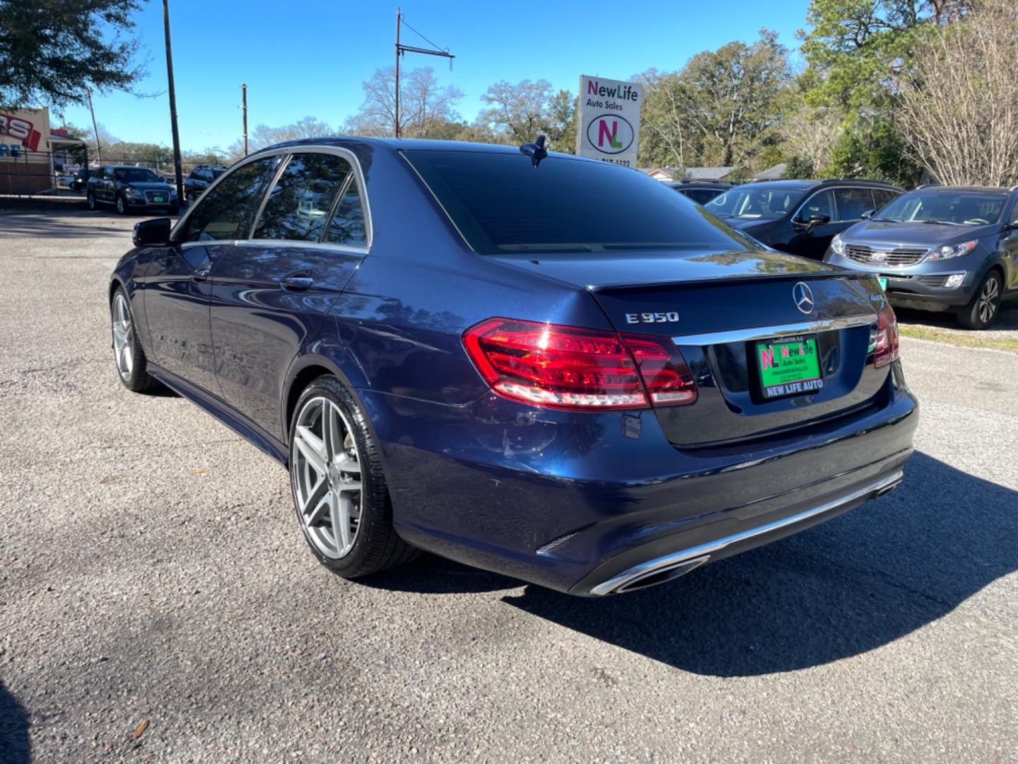 2014 BLUE MERCEDES-BENZ E-CLASS E 350 LUXURY 4MATIC (WDDHF8JB1EB) with an 3.5L engine, Automatic transmission, located at 5103 Dorchester Rd., Charleston, SC, 29418-5607, (843) 767-1122, 36.245171, -115.228050 - Beautiful & Clean Interior with Leather, Sunroof, Navigation, Backup Camera, Push button start, CD/AUX/Sat/Bluetooth, Dual Climate Control, Power Everything (windows, locks, seats, mirrors), Power Rear Sunshade, Heated/Memory Seating, Keyless Entry, Alloy Wheels. Clean CarFax (no accidents reported! - Photo#4